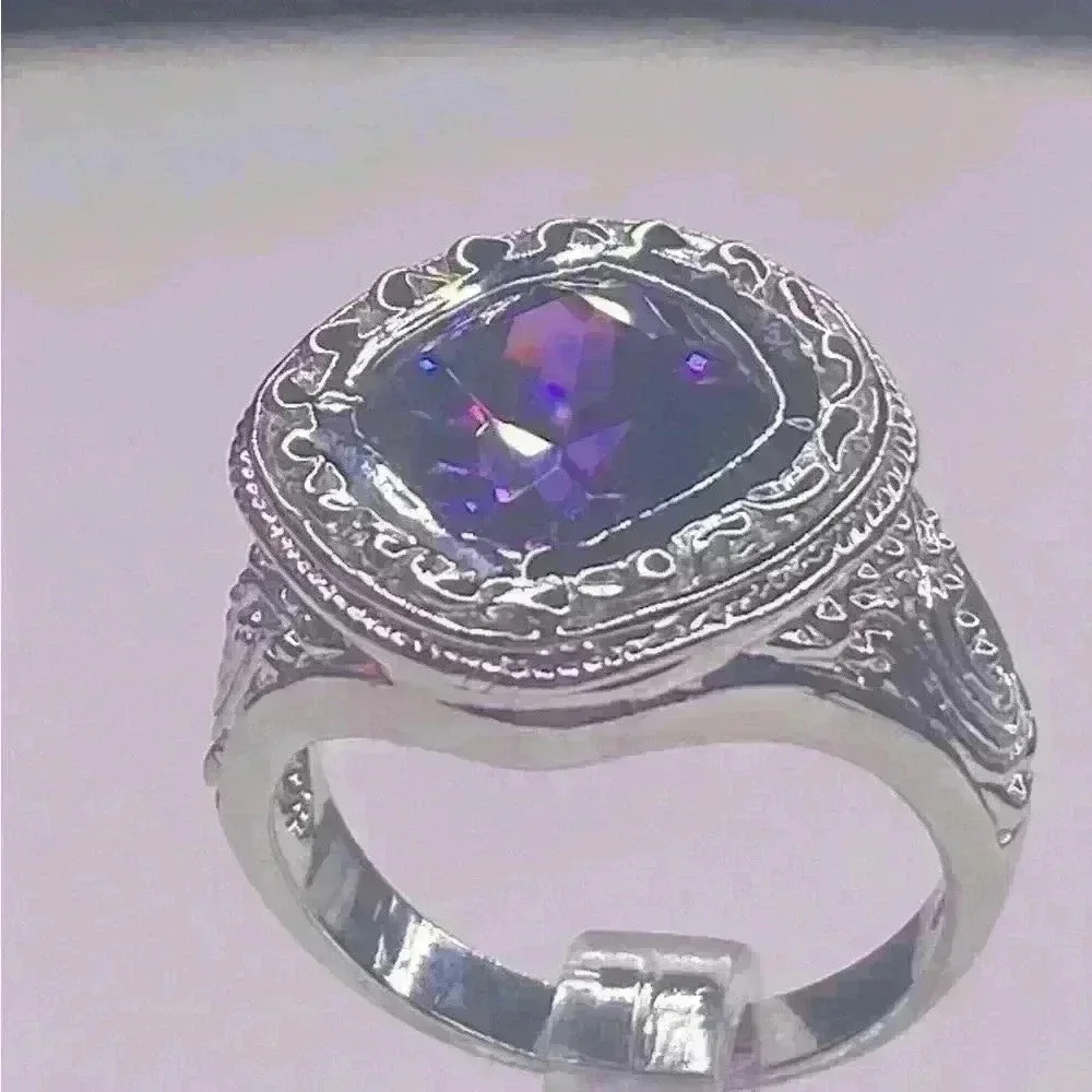 AMETHYST SIMULATED SET IN STERLING SILVER